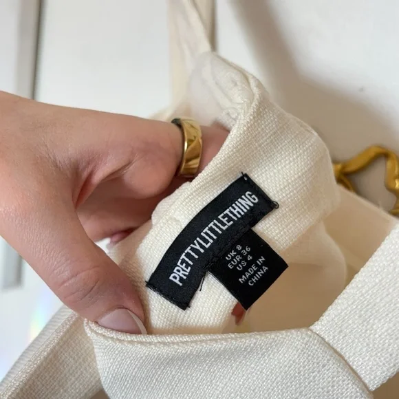 PrettyLittleThing CREAM TWILL CUT OUT BOW SHIFT DRESS - Picture 9 of 11